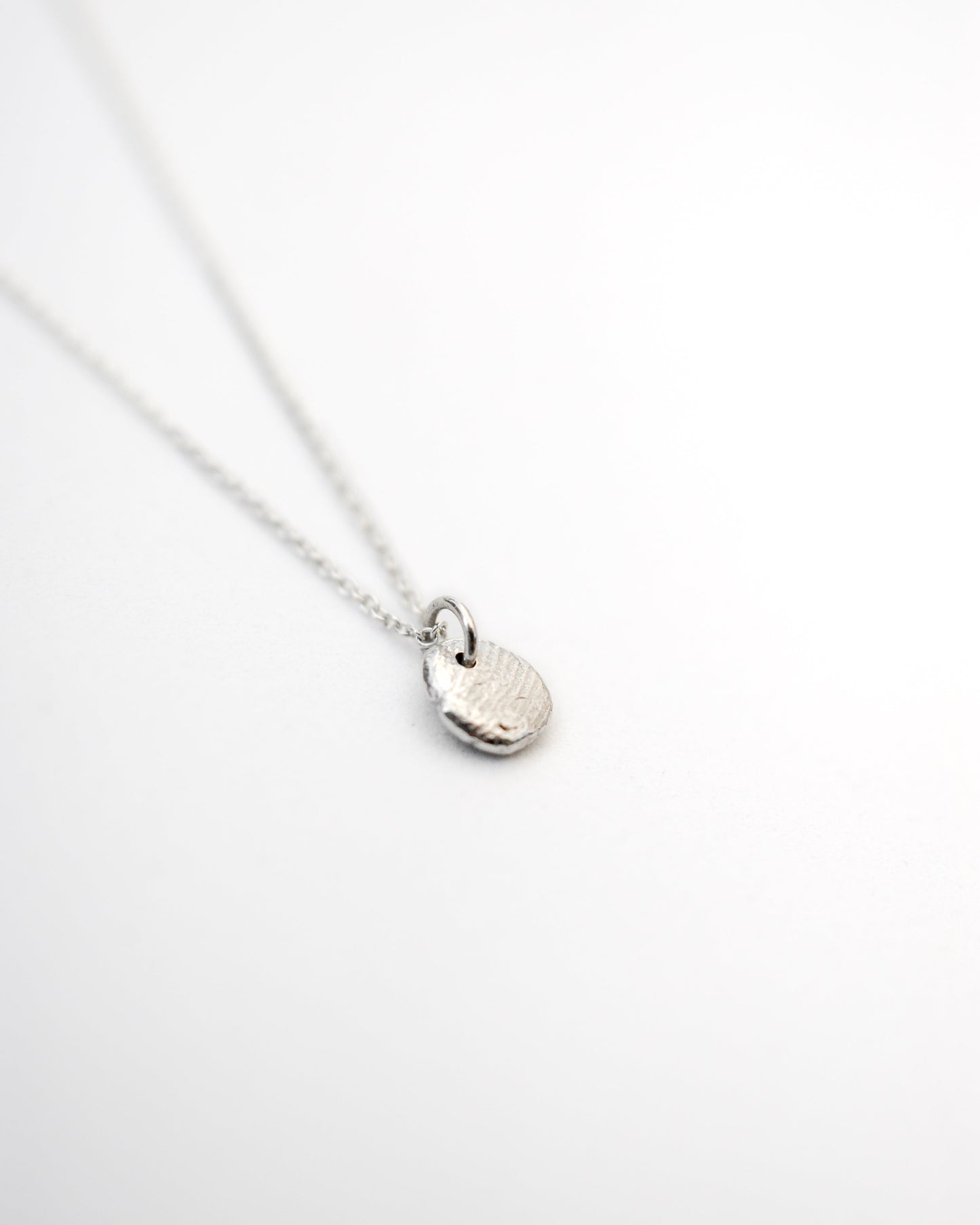 Collana Impronte small
