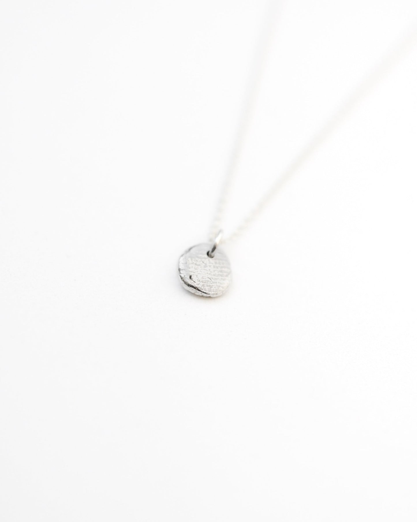 Collana Impronte small